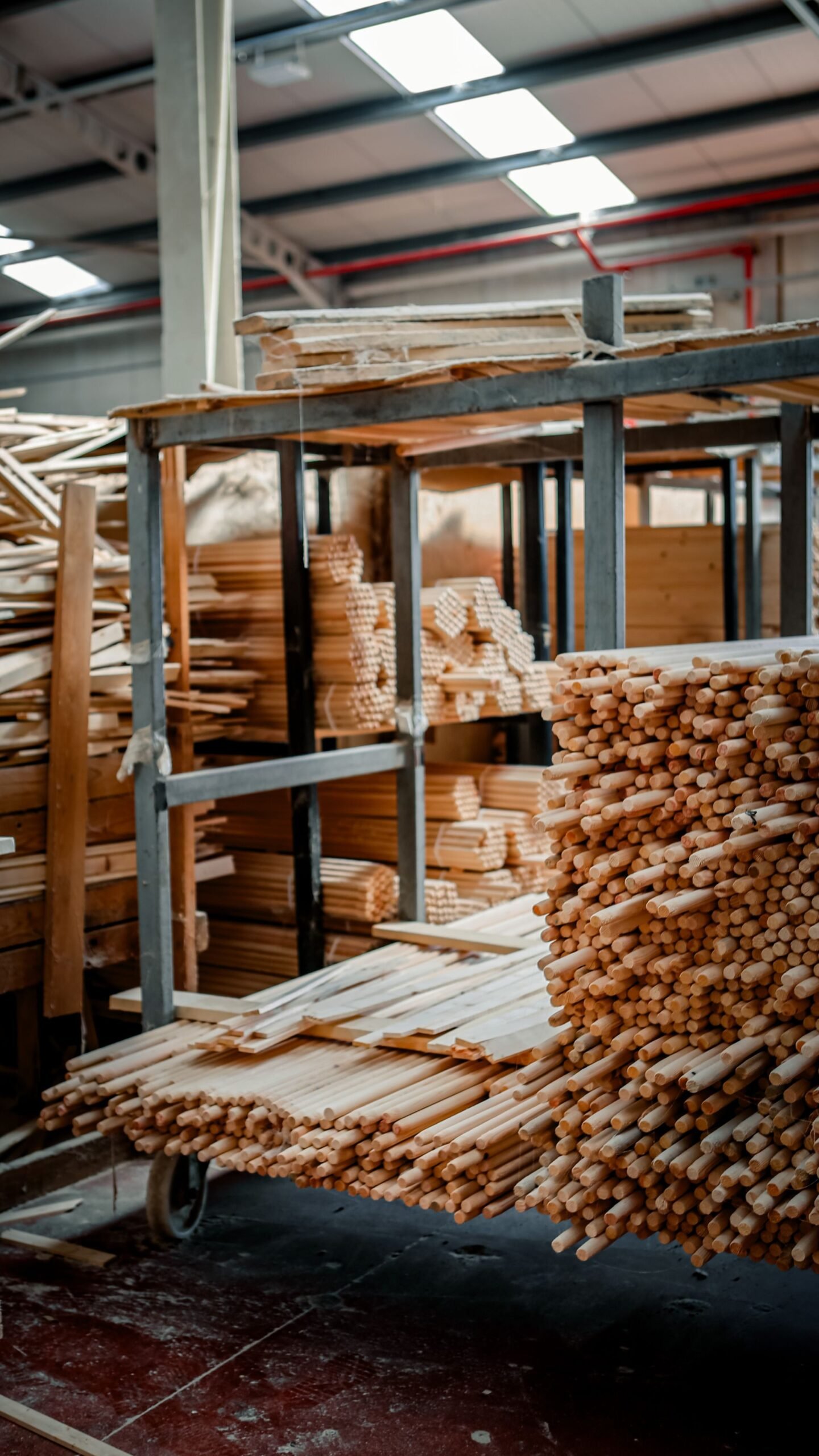 Kiln-dried pine stretcher bars stacked for assembly
