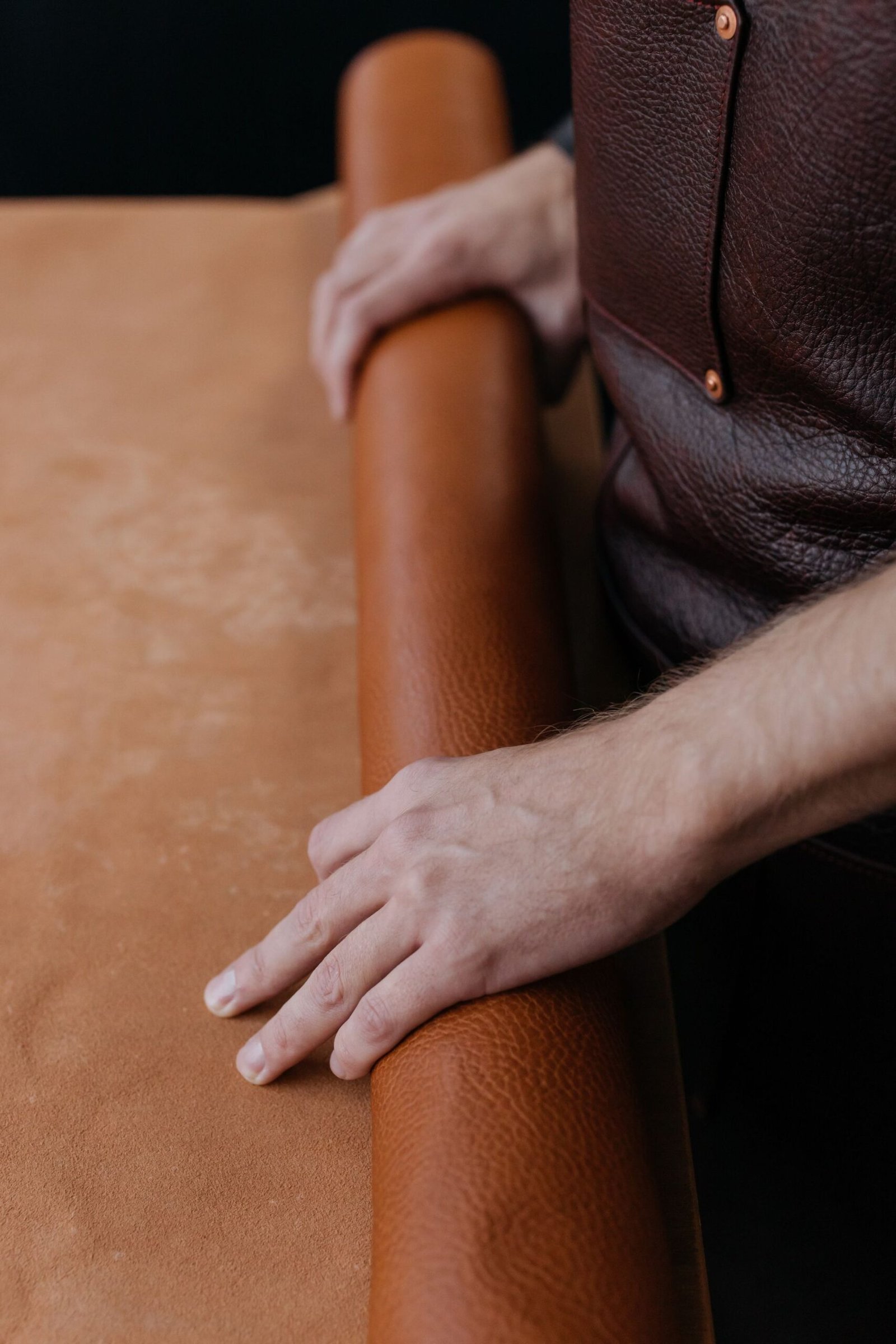Roll of raw canvas fabric partially unrolled